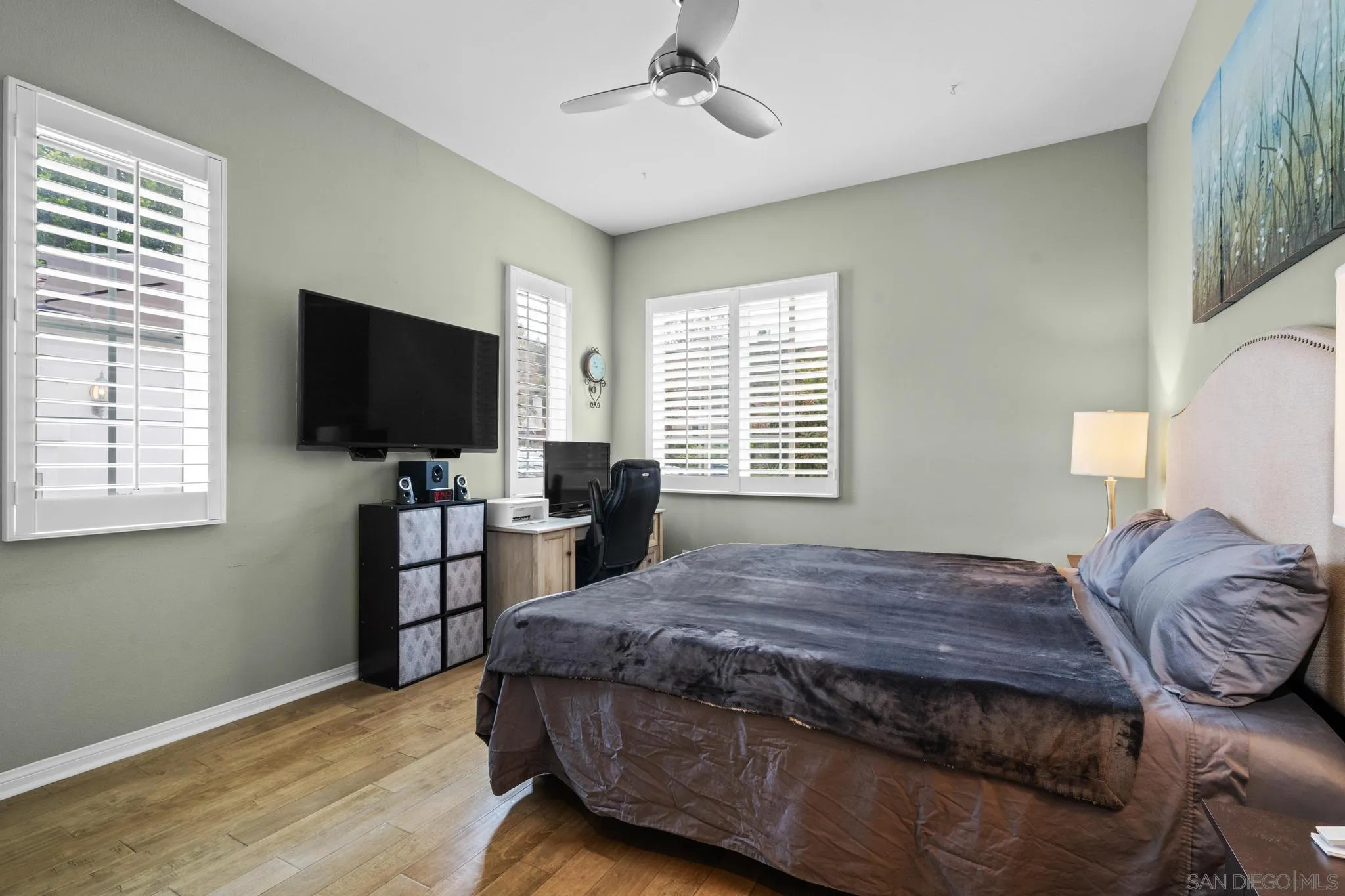 3252 Hidden Estates Lane Escondido, CA 92027 - Photo 20 of 32 a bedroom with a bed and a flat screen tv