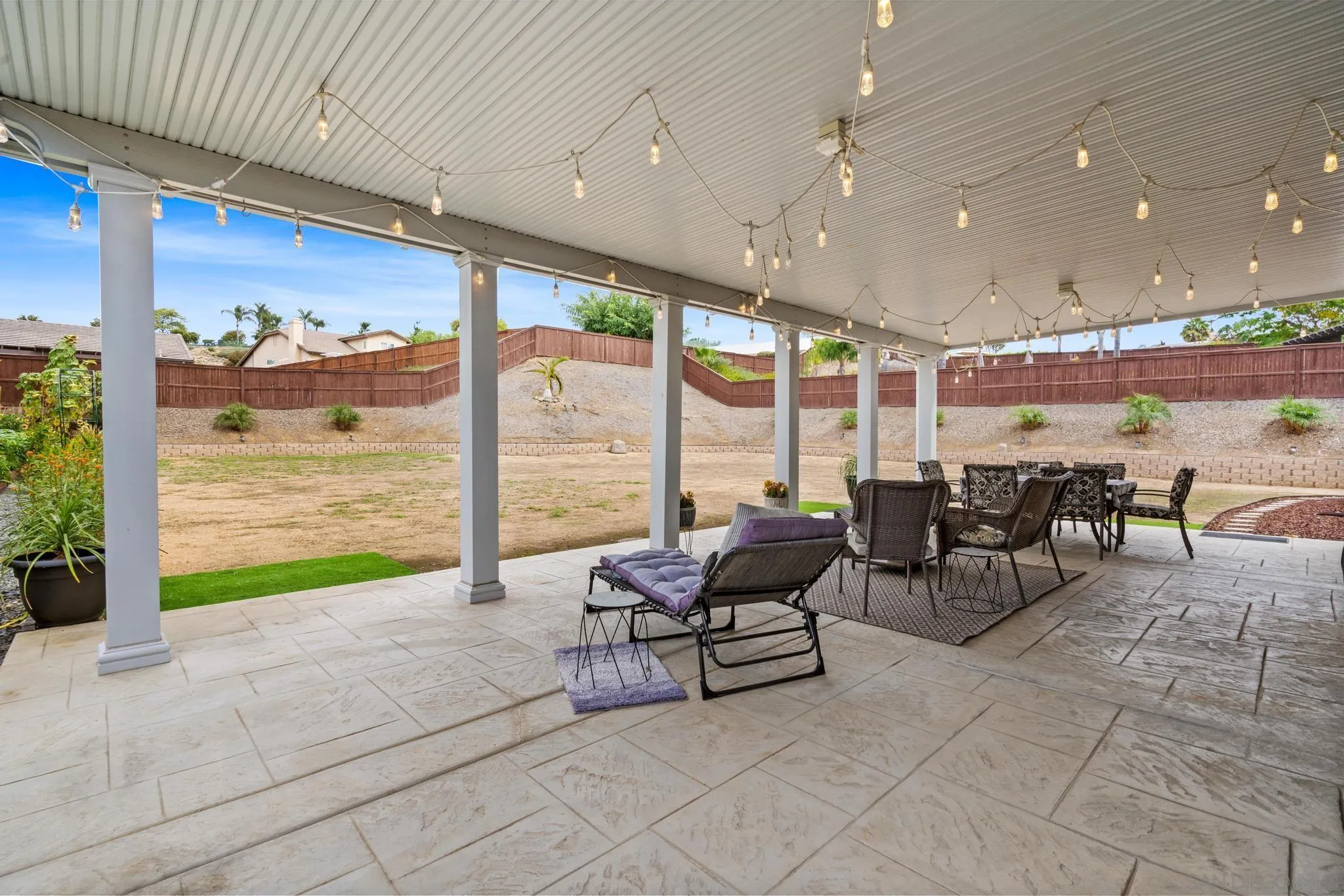 3252 Hidden Estates Lane Escondido, CA 92027 - Photo 25 of 32 a living room with furniture and a floor to ceiling window