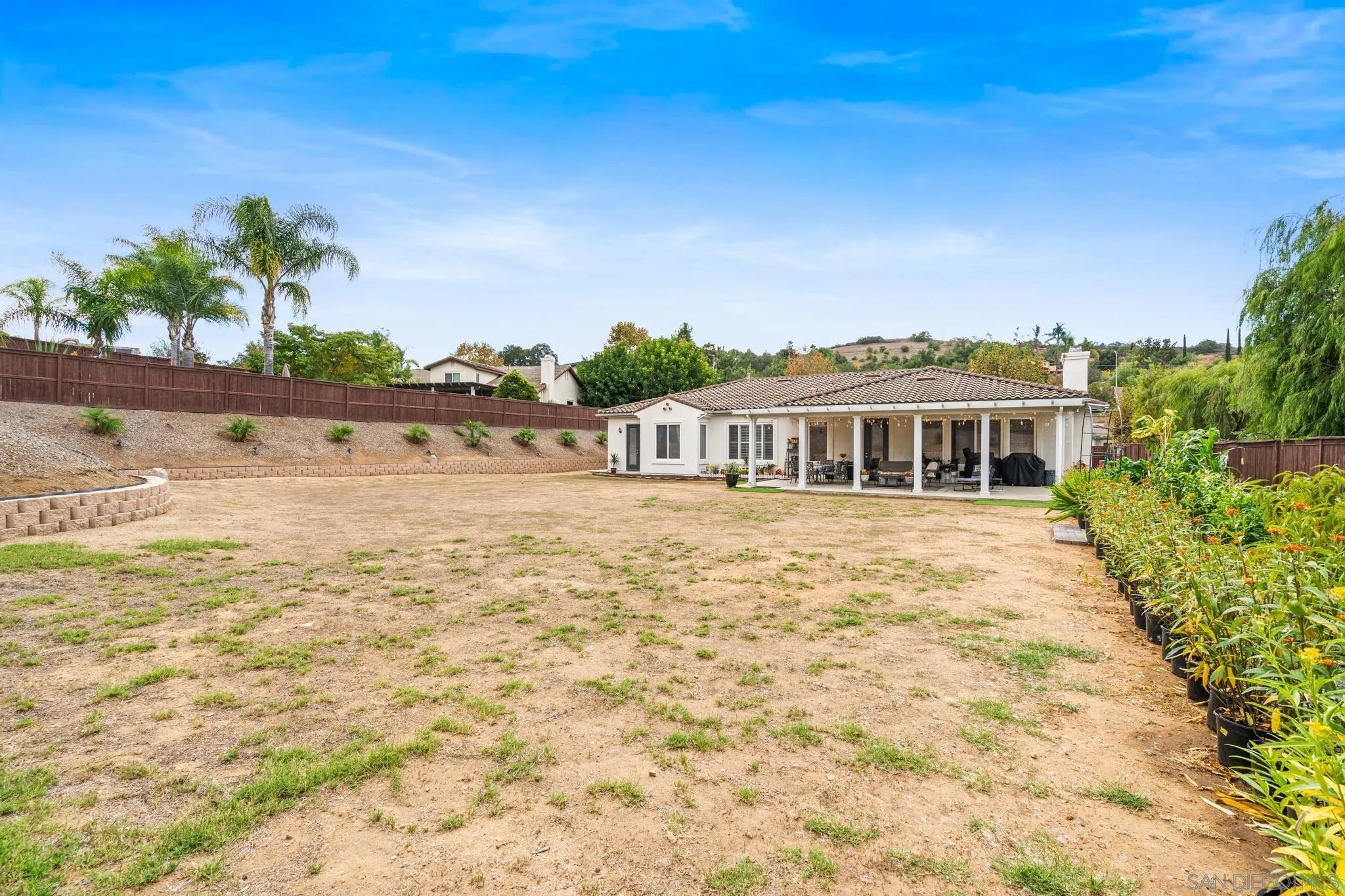 3252 Hidden Estates Lane Escondido, CA 92027 - Photo 28 of 32 a balcony with table and chairs