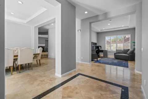 a view of a living room and dining room