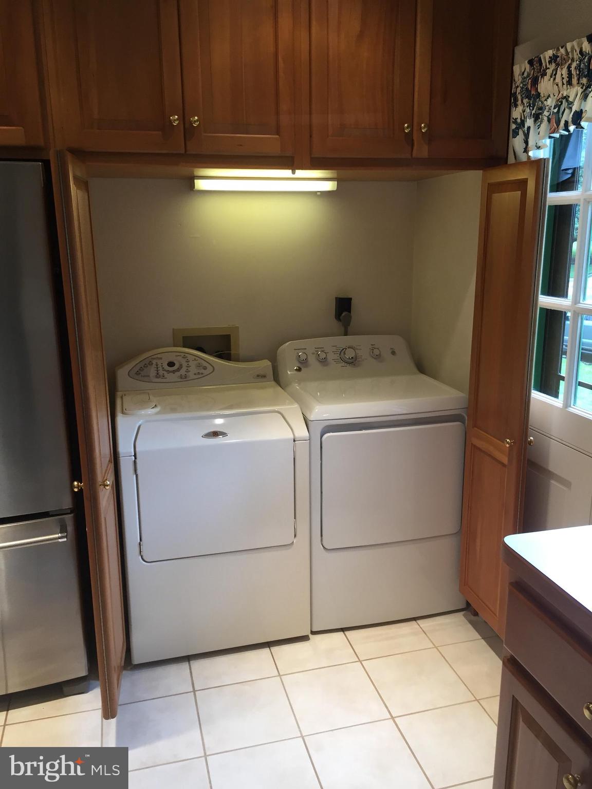 9118 Dunloggin Road Ellicott City, MD 21042 - Photo 15 of 49 Main Level Laundry