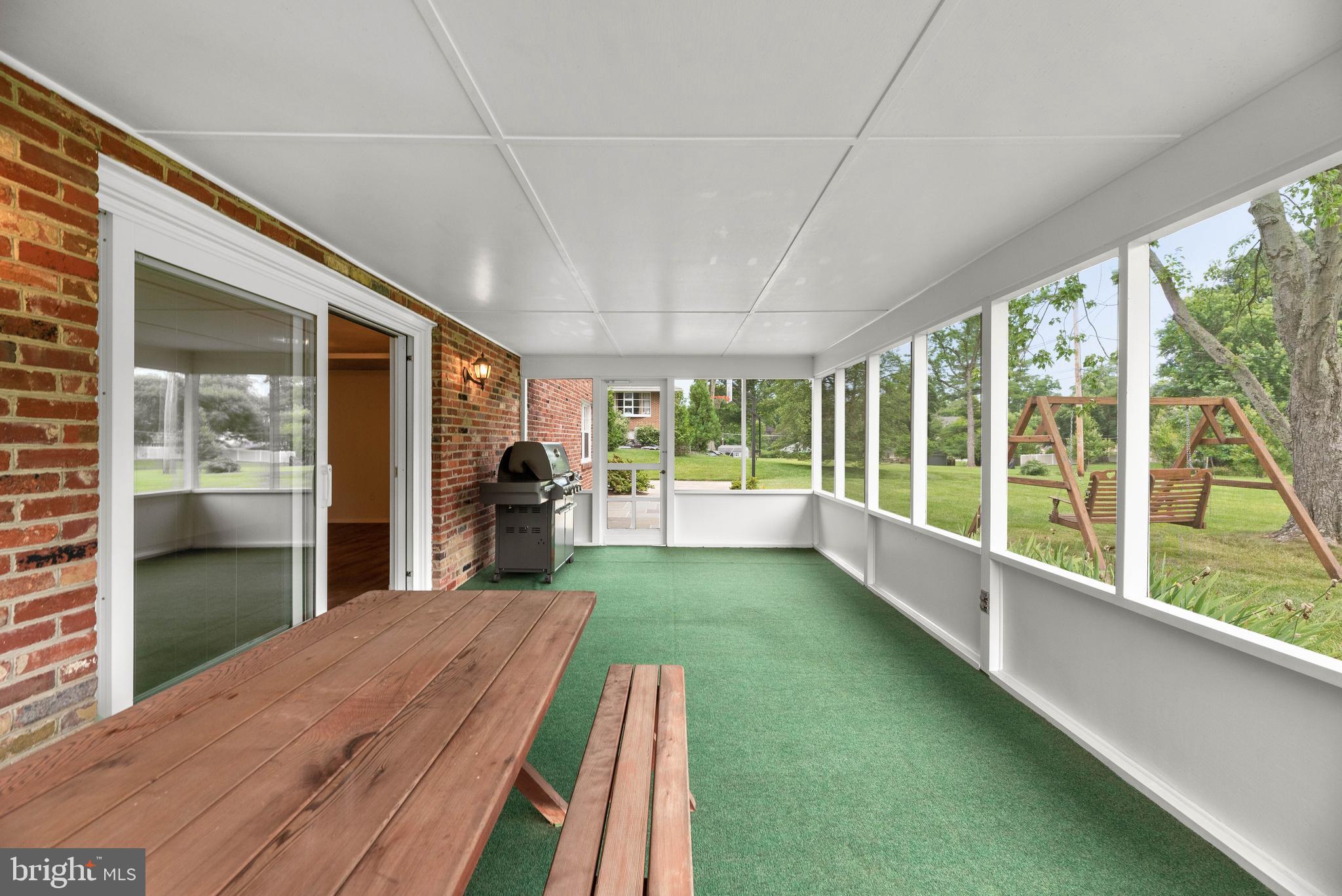 9118 Dunloggin Road Ellicott City, MD 21042 - Photo 34 of 49 Screened Porch