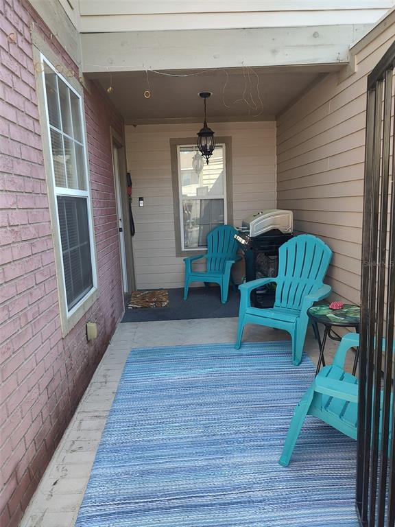 a porch with seating space