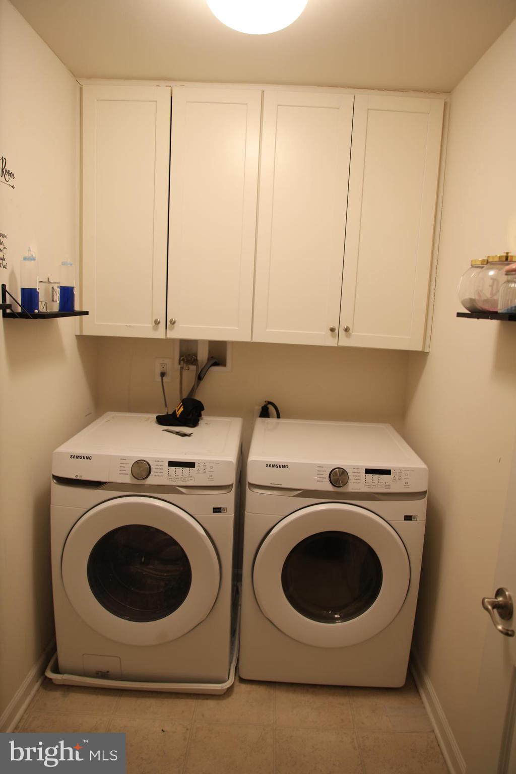 10431 Windlass Run Road Baltimore, MD 21220 - Photo 13 of 16 a utility room with dryer and washer