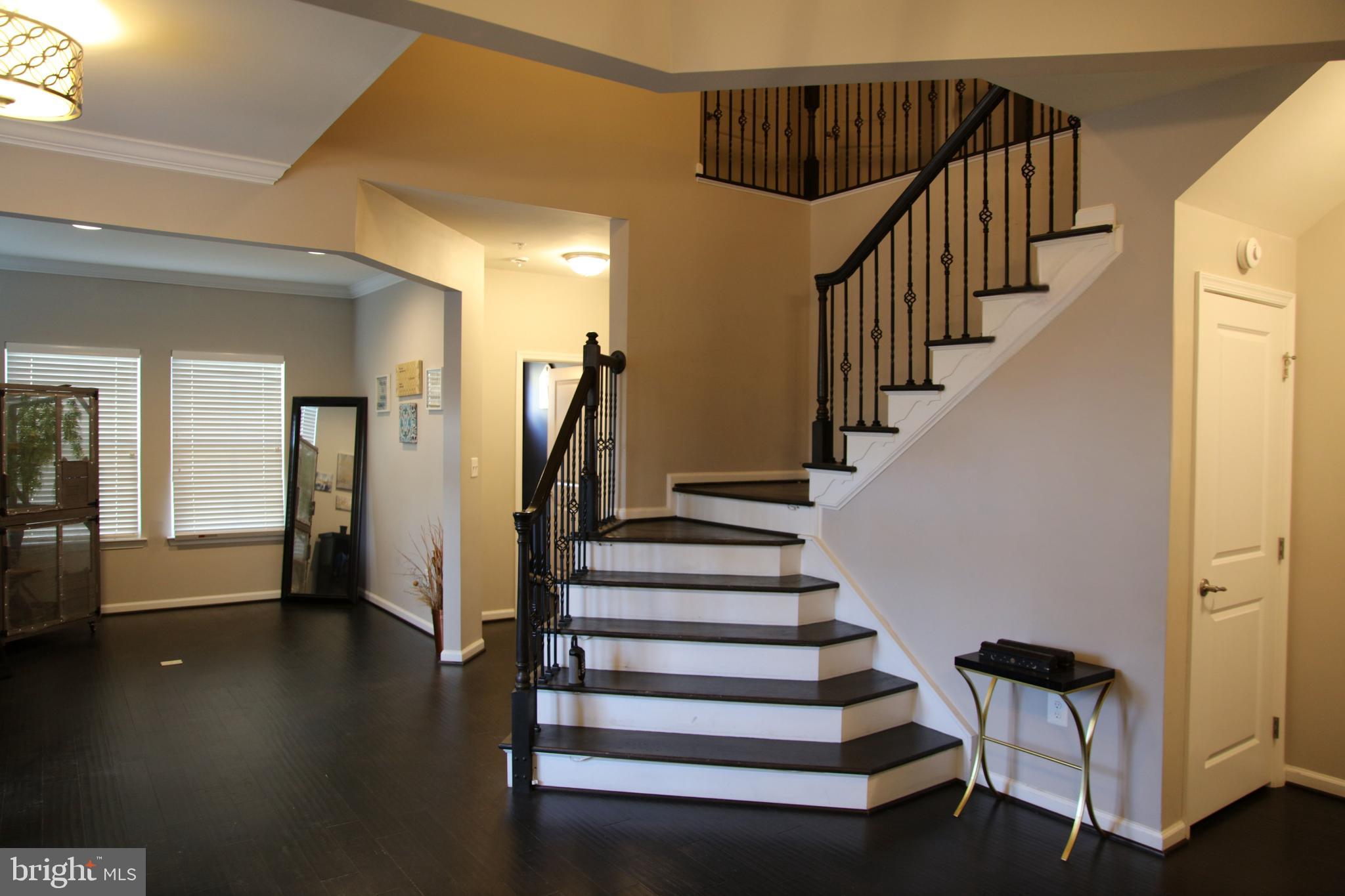 10431 Windlass Run Road Baltimore, MD 21220 - Photo 2 of 16 a view of entryway with wooden floor
