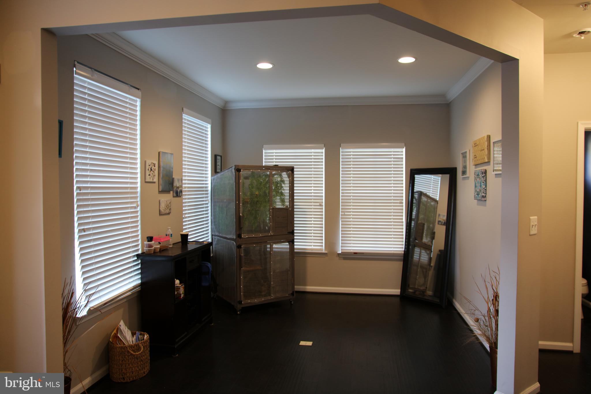 10431 Windlass Run Road Baltimore, MD 21220 - Photo 5 of 16 a view of hallway with furniture and a window