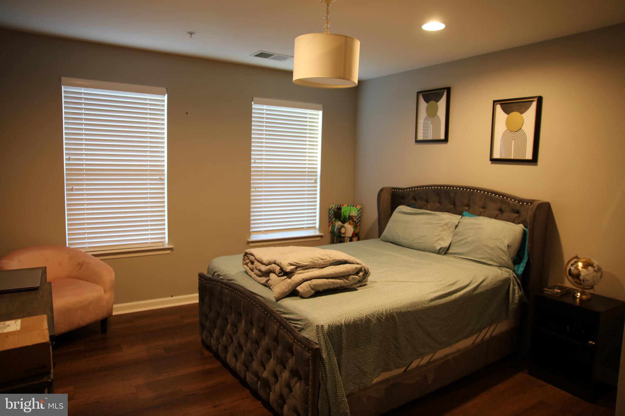 10431 Windlass Run Road Baltimore, MD 21220 - Photo 9 of 16 a bedroom with a bed and a window