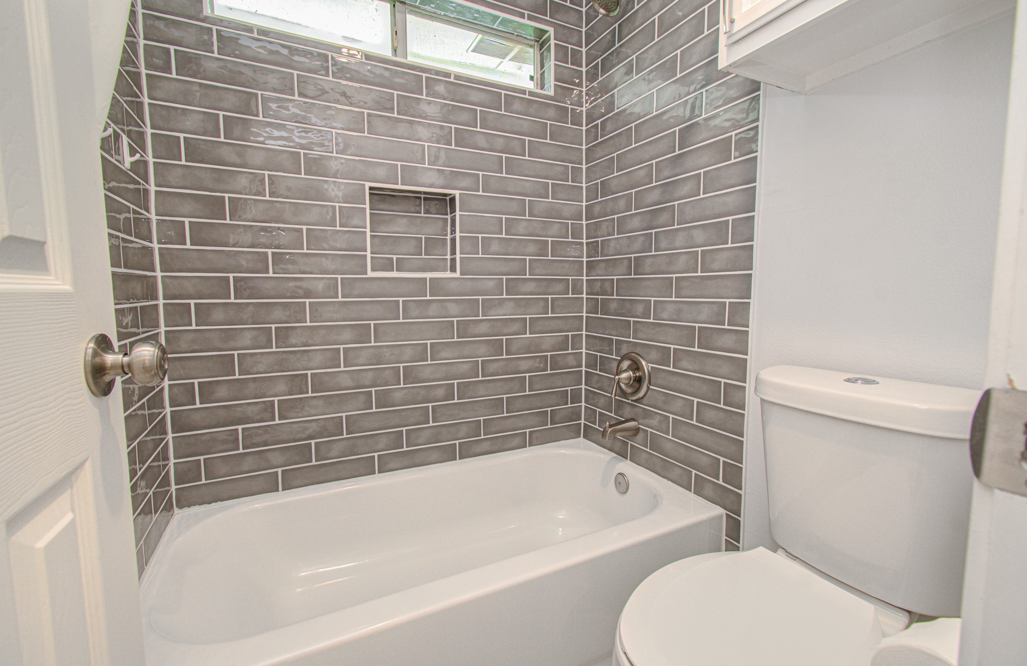 22927 Northoak Forest Lane Spring, TX 77389 - Photo 26 of 37 a bathroom with a toilet bathtub and shower