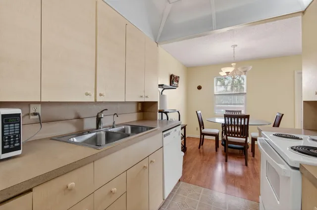 a view of a hardwood floor in a room