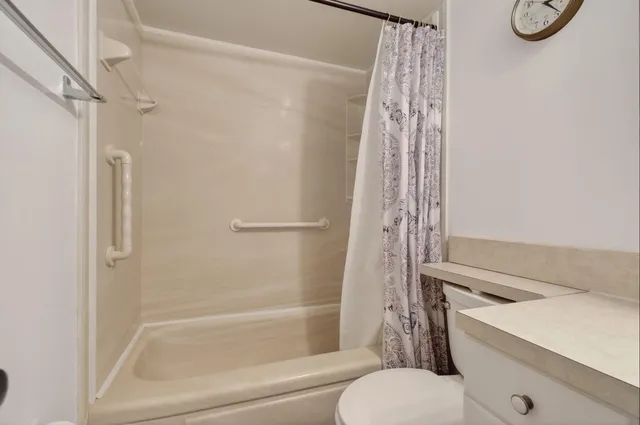 a view of a lake with a city