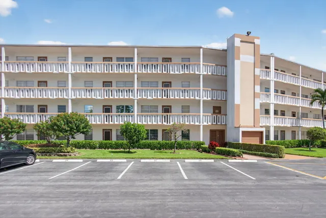a tall building sitting on the side of a street