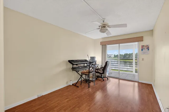 a view of a building with a yard