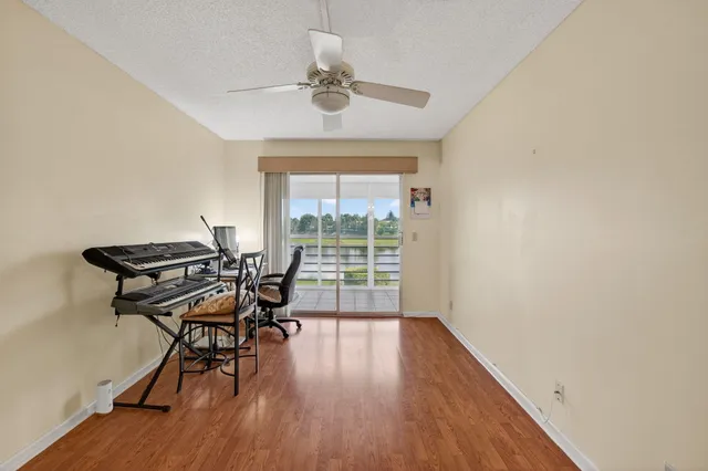 a view of lake with green space