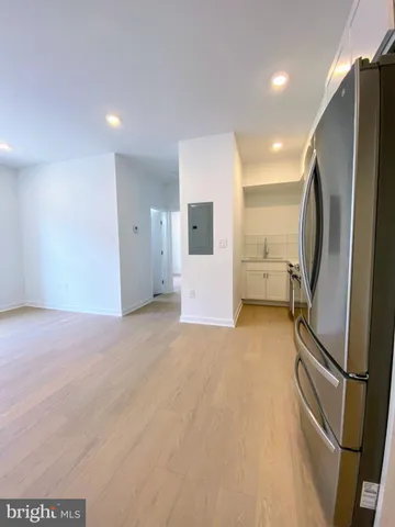 a view of a refrigerator in kitchen and a refrigerator