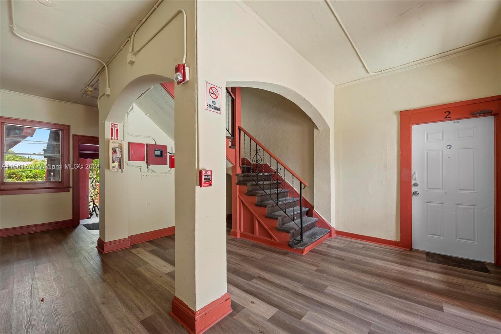 1785 Southwest 13th Street Miami, FL 33145 - Photo 11 of 16 a view of entryway and hall with wooden floor
