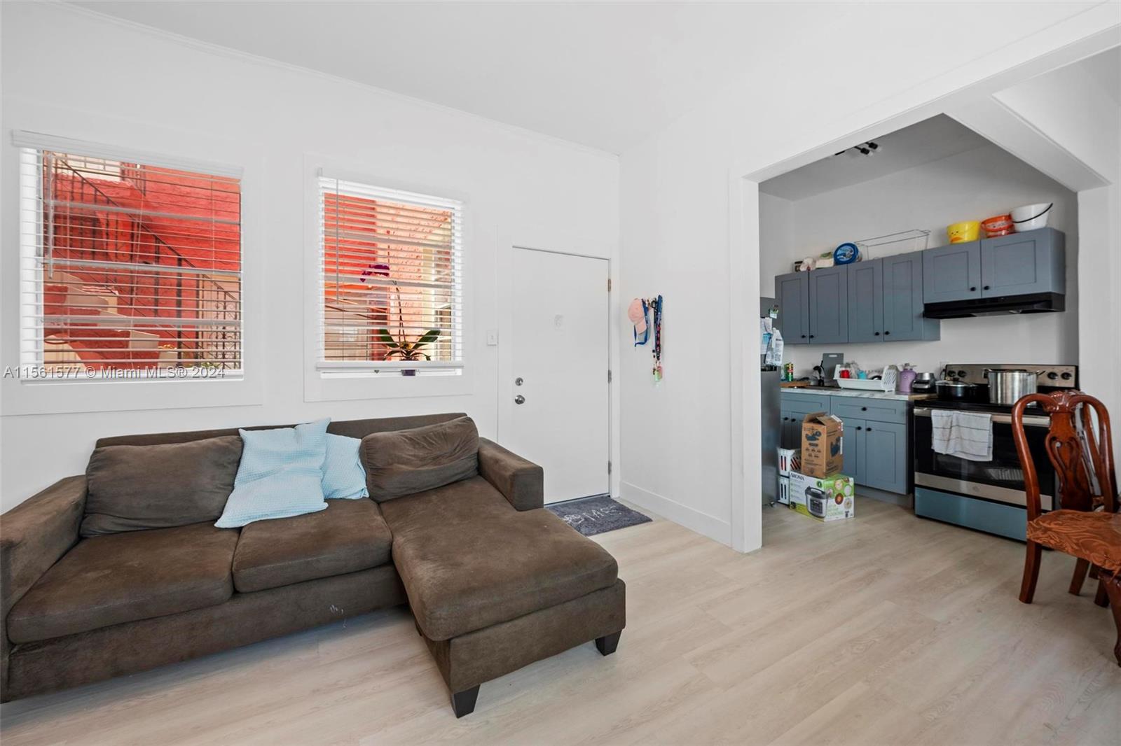 1785 Southwest 13th Street Miami, FL 33145 - Photo 12 of 16 a living room with furniture and a window