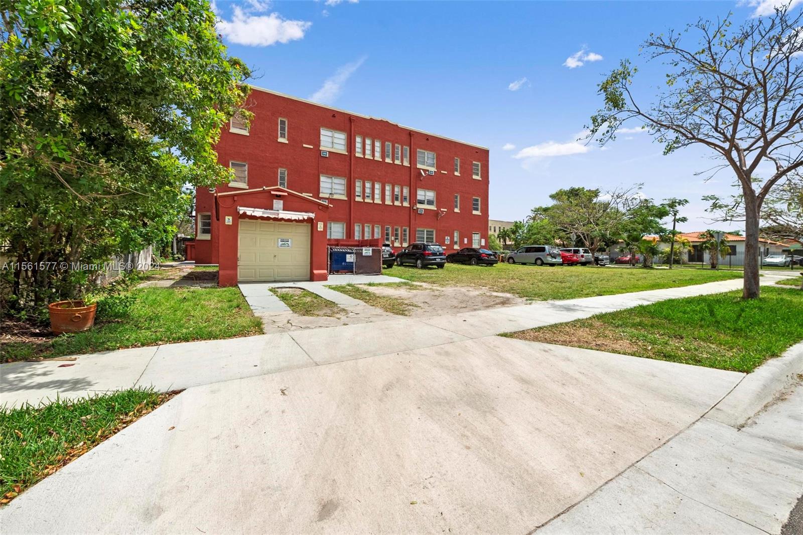 1785 Southwest 13th Street Miami, FL 33145 - Photo 3 of 16 a view of a building with a yard