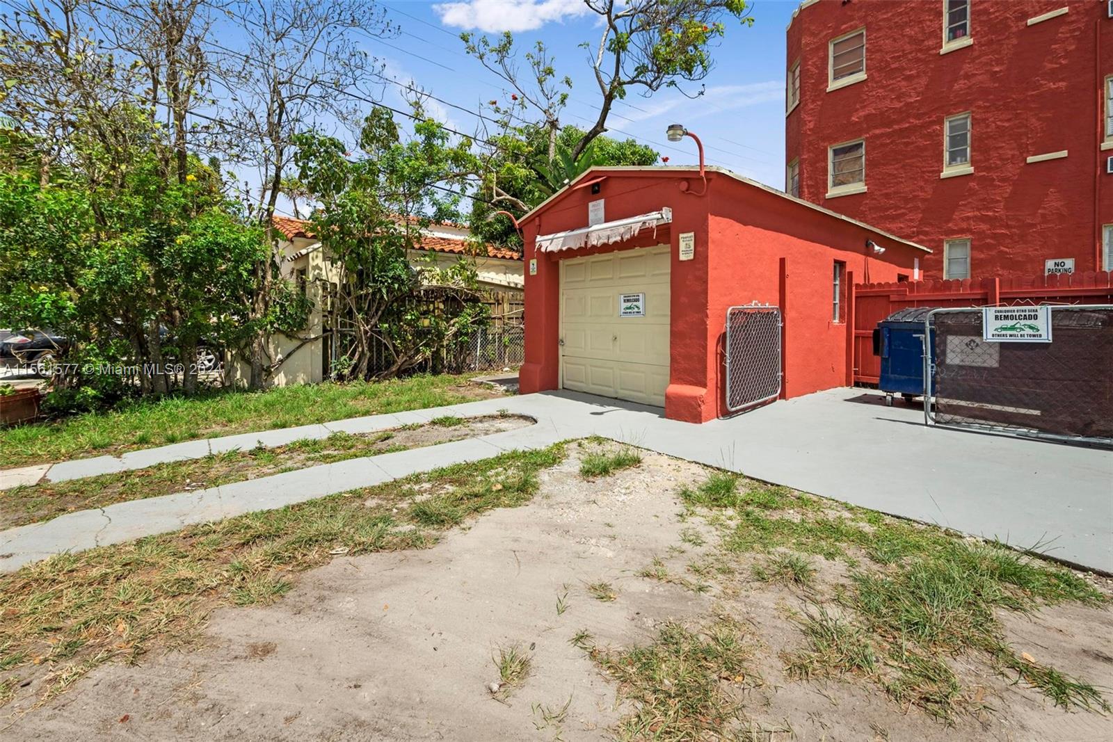 1785 Southwest 13th Street Miami, FL 33145 - Photo 4 of 16 a front view of a building with a yard