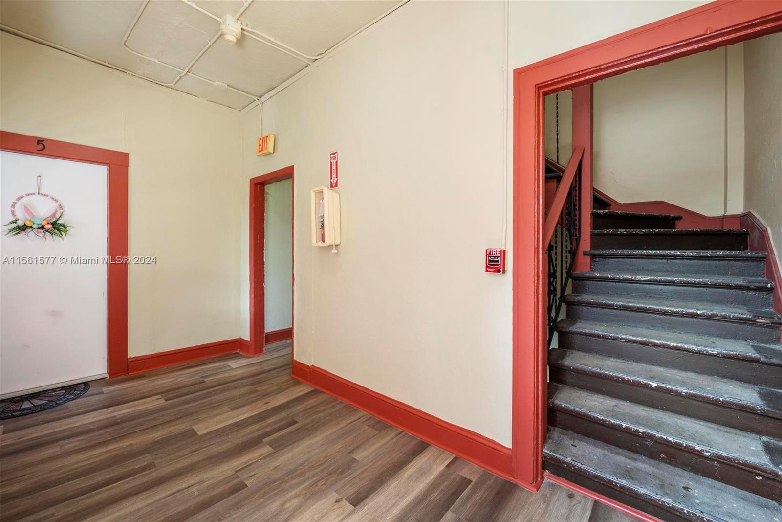 1785 Southwest 13th Street Miami, FL 33145 - Photo 7 of 16 a view of a hallway with wooden floor and entryway