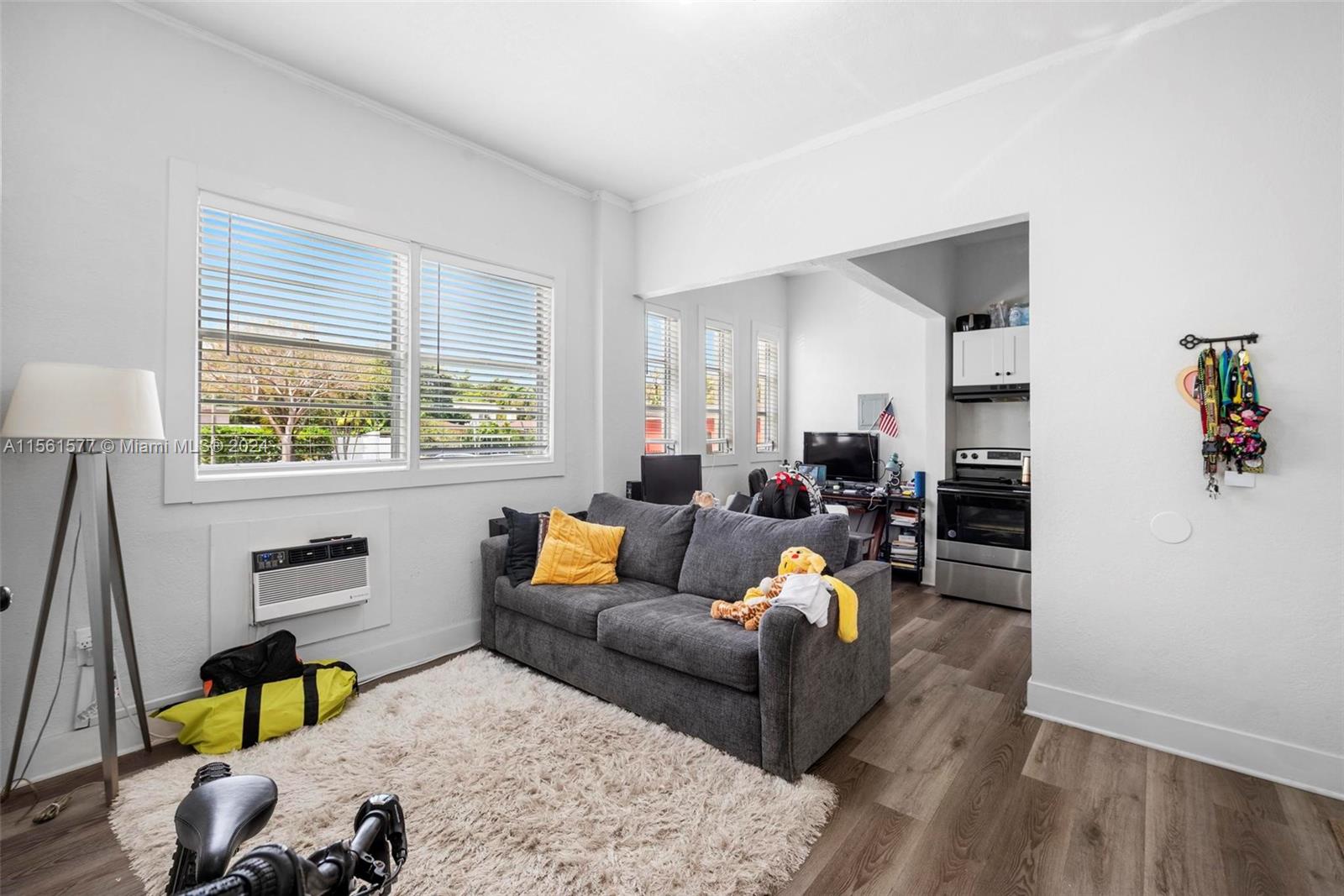 1785 Southwest 13th Street Miami, FL 33145 - Photo 10 of 16 a living room with furniture and a window