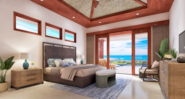 a bedroom with furniture and a large window