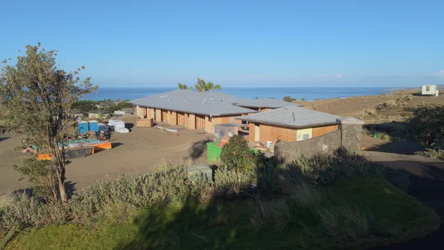 a front view of a house with yard