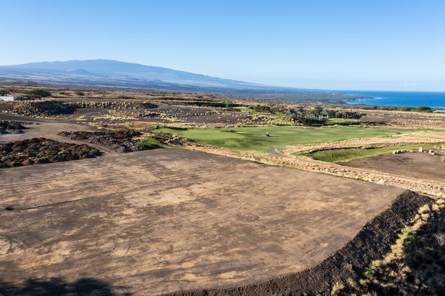 a view of a city with an ocean