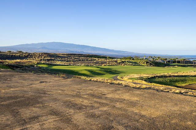 a view of an ocean and city