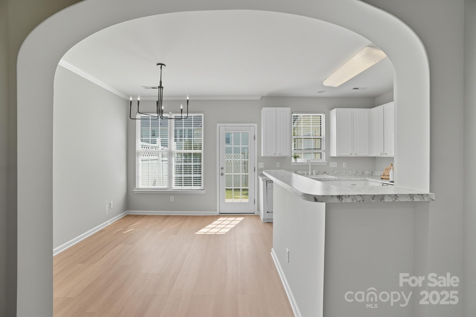 507 Poseidon Way Fort Mill, SC 29708 - Photo 4 of 19 a view of a kitchen with a sink cabinets and a window
