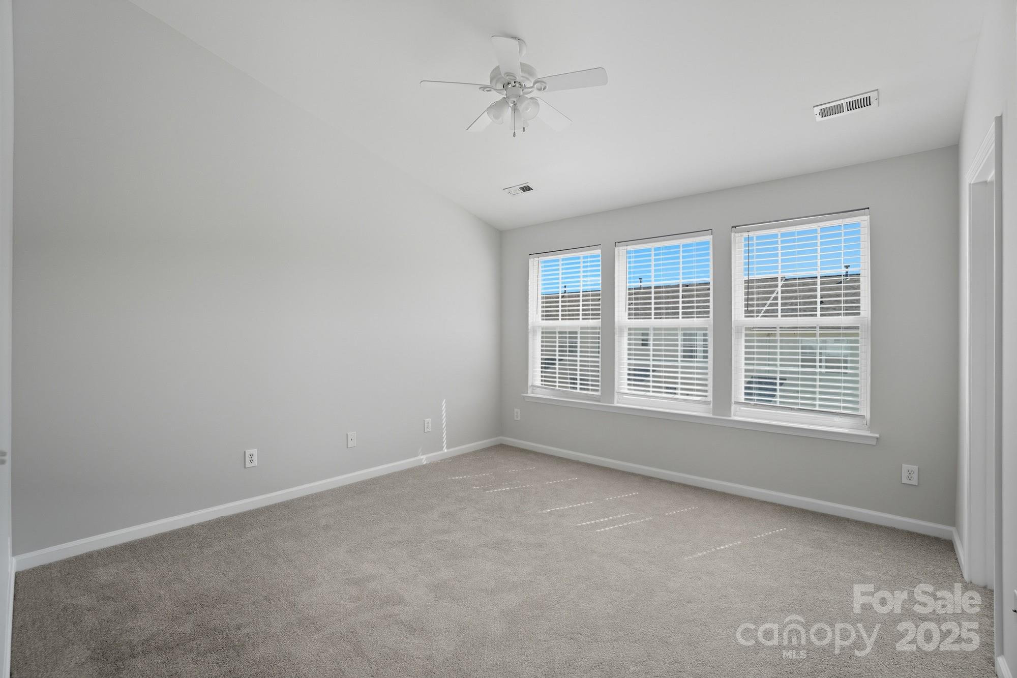 507 Poseidon Way Fort Mill, SC 29708 - Photo 6 of 19 a view of an empty room with a window
