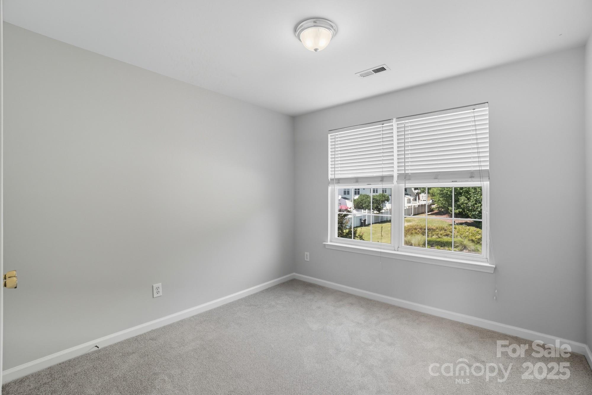 507 Poseidon Way Fort Mill, SC 29708 - Photo 10 of 19 an empty room with windows