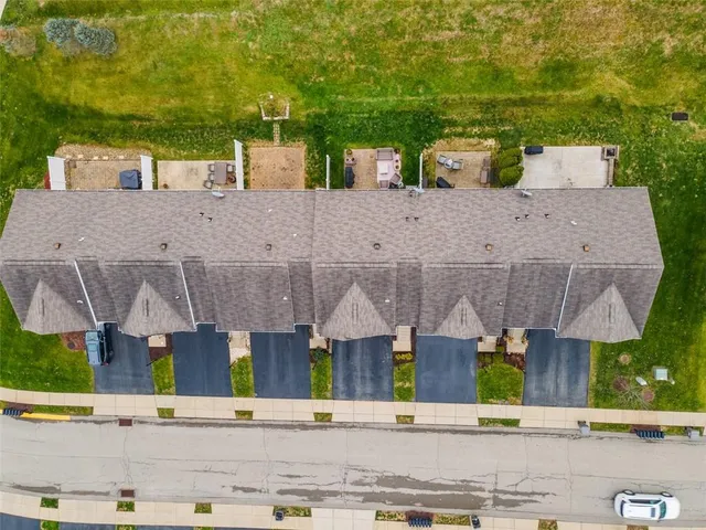 a aerial view of a house with street view
