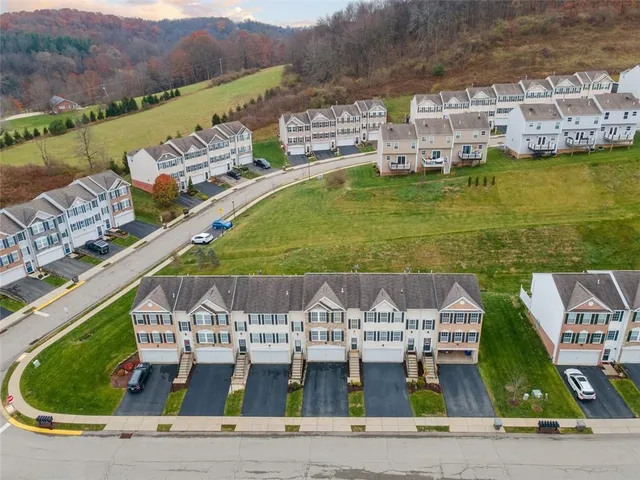 a view of building with outdoor space and seating