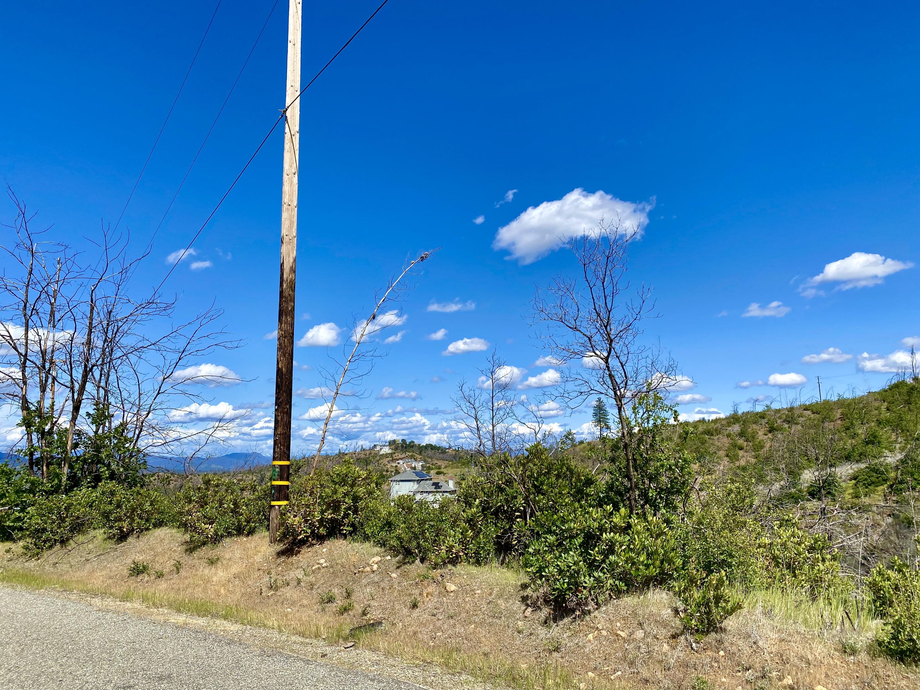 Muletown Road Redding, CA 96001 - Photo 6 of 6 a front view of a house with a yard