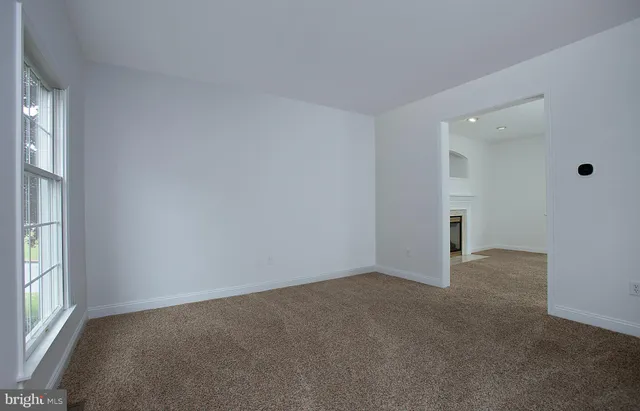 a kitchen with stainless steel appliances granite countertop a sink stove and microwave