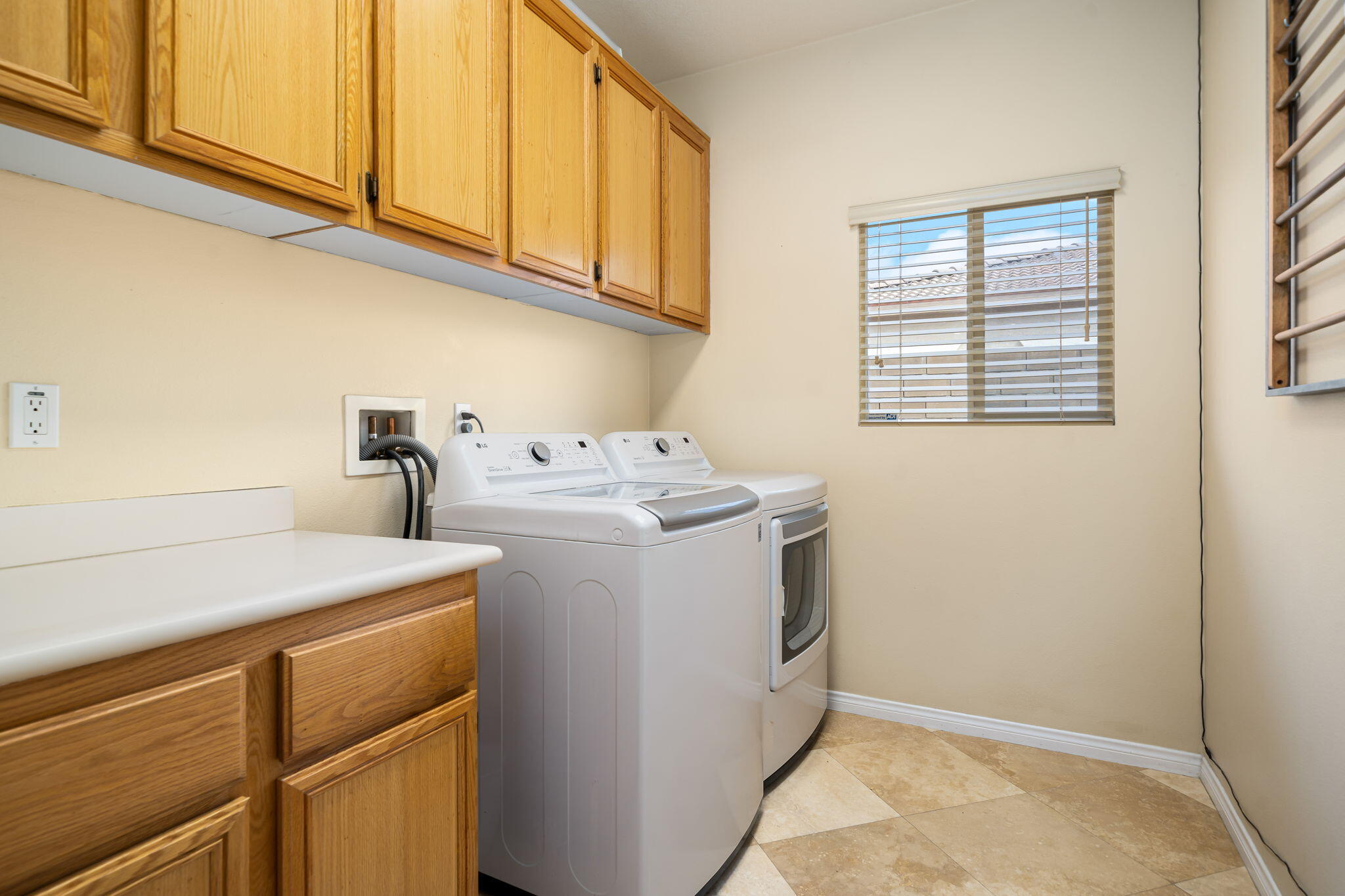 41222 Mackenzie Lane Indio, CA 92203 - Photo 21 of 27 a utility room with dryer and washer