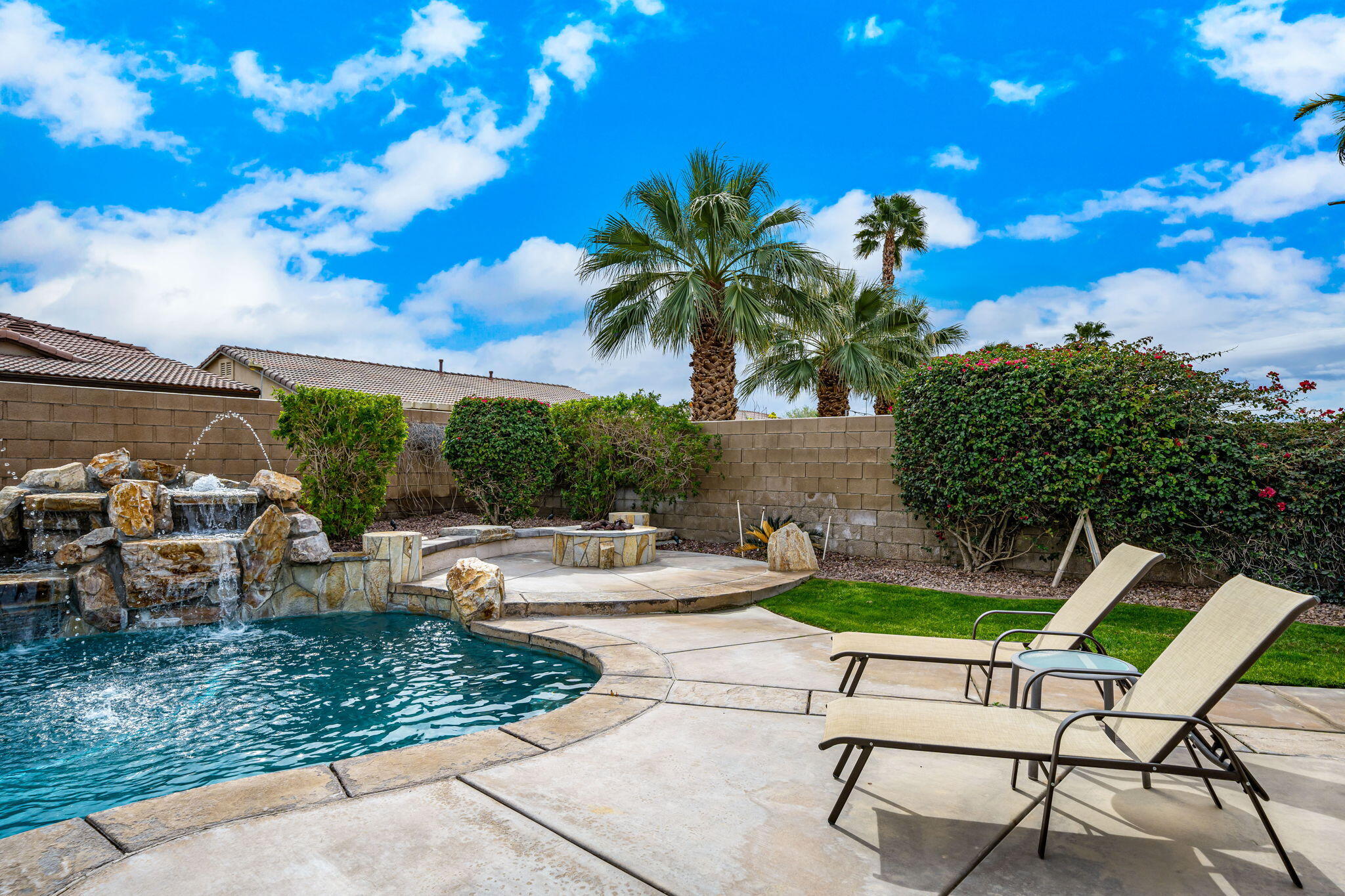 41222 Mackenzie Lane Indio, CA 92203 - Photo 25 of 27 a view of a backyard with sitting area