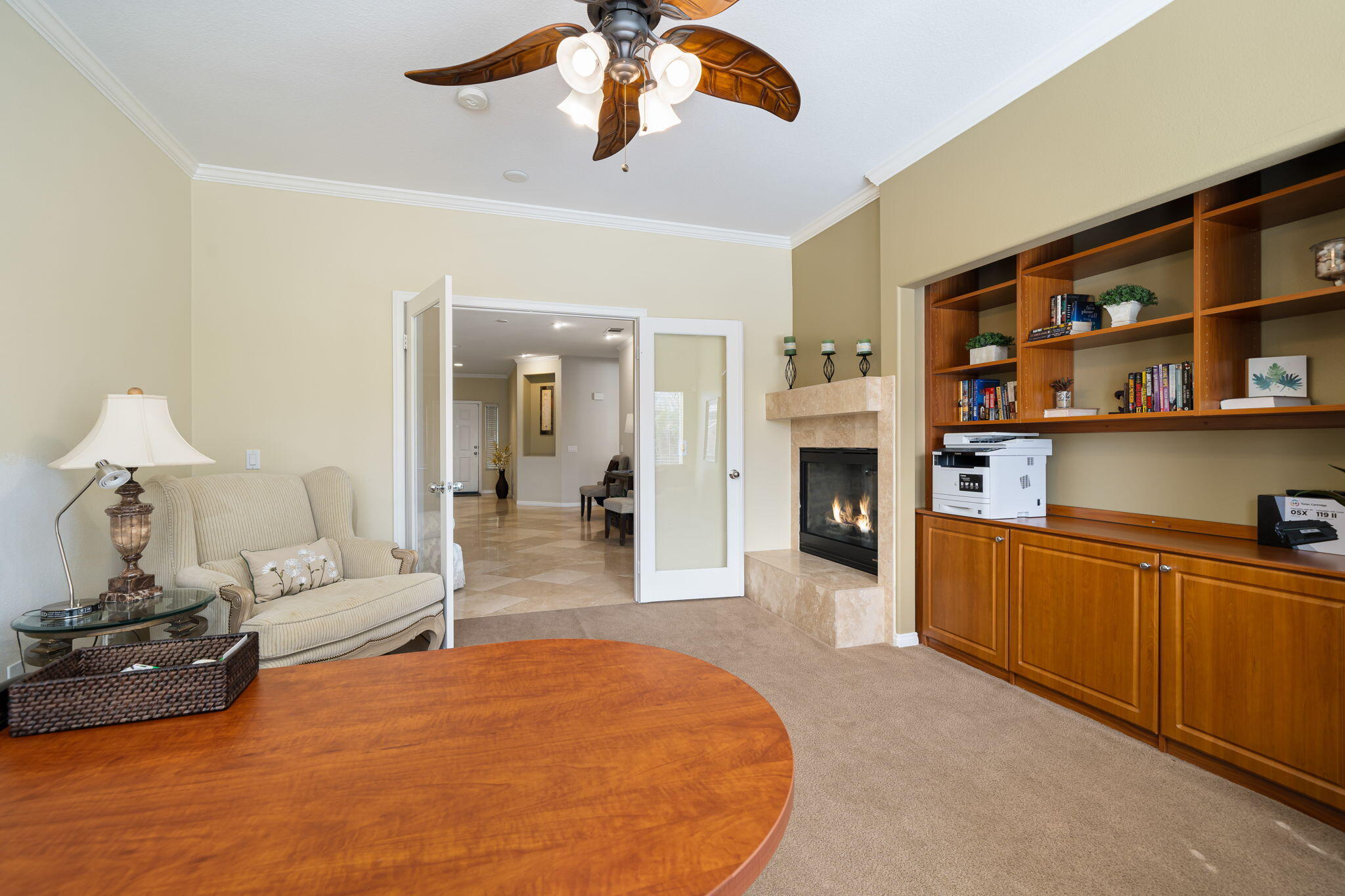 41222 Mackenzie Lane Indio, CA 92203 - Photo 7 of 27 a bedroom with furniture and a fireplace