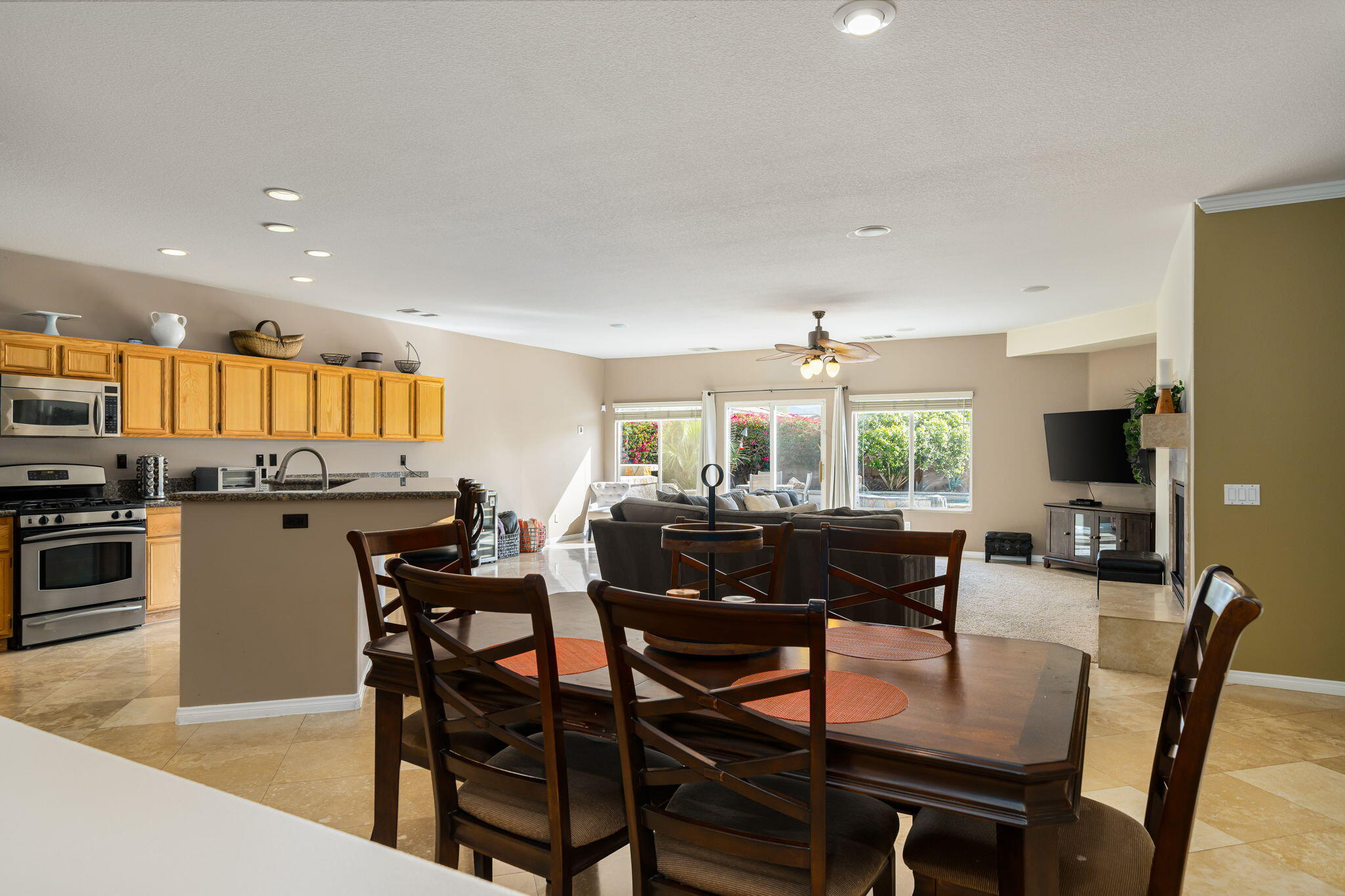 41222 Mackenzie Lane Indio, CA 92203 - Photo 10 of 27 a view of a dining room with furniture