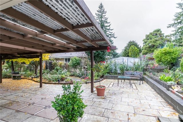 a garden view with a seating space