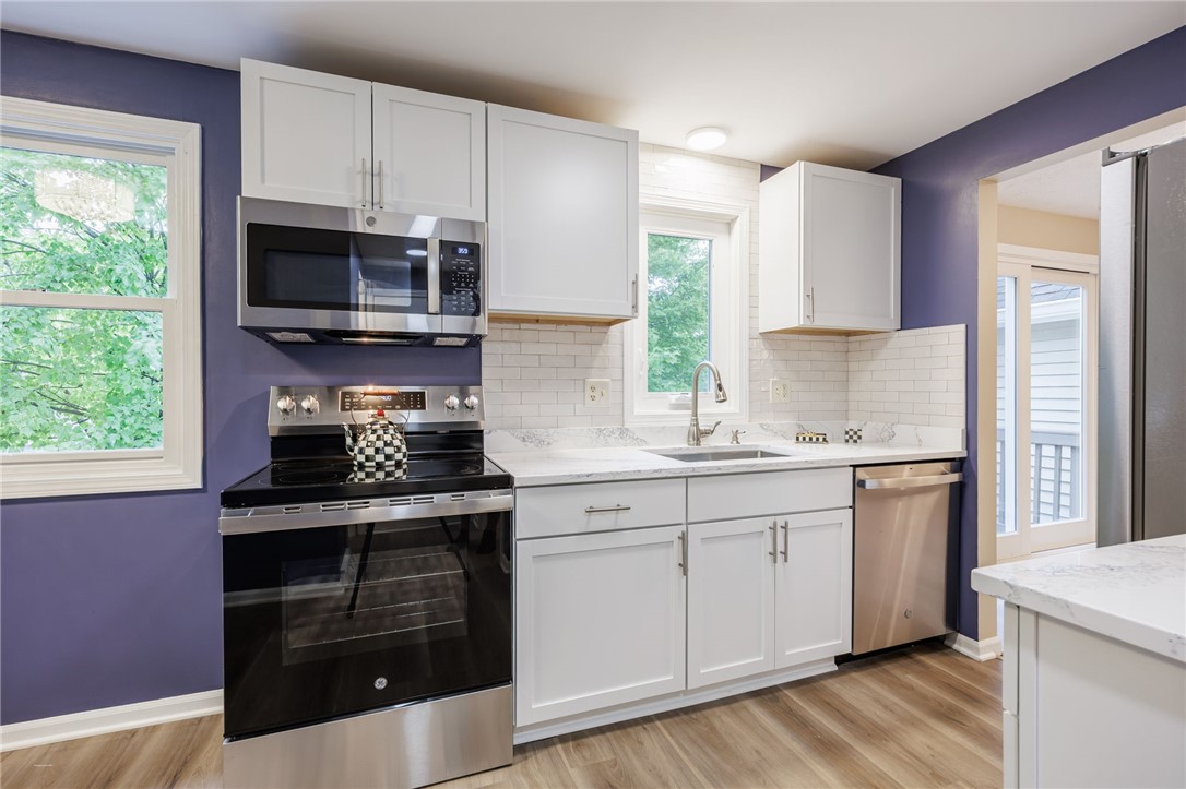 3431 South Winton Road Henrietta, NY 14623 - Photo 10 of 37 Enjoy all new Stainless Appliances, Quartz Counter