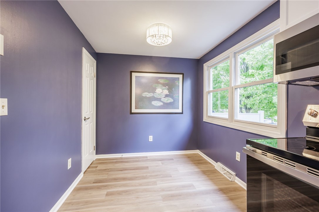 3431 South Winton Road Henrietta, NY 14623 - Photo 12 of 37 Wonderful Eat-in Kitchen area with walk in pantry
