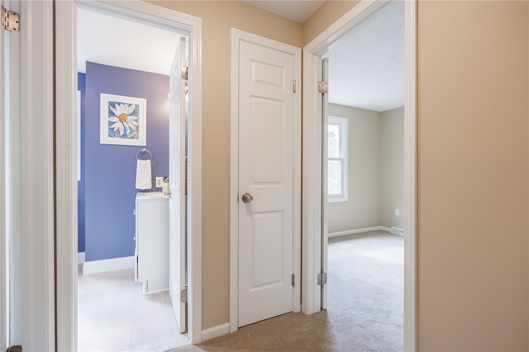 3431 South Winton Road Henrietta, NY 14623 - Photo 20 of 37 Upstairs Hallway. Full Bath and Linen Closet. Ent
