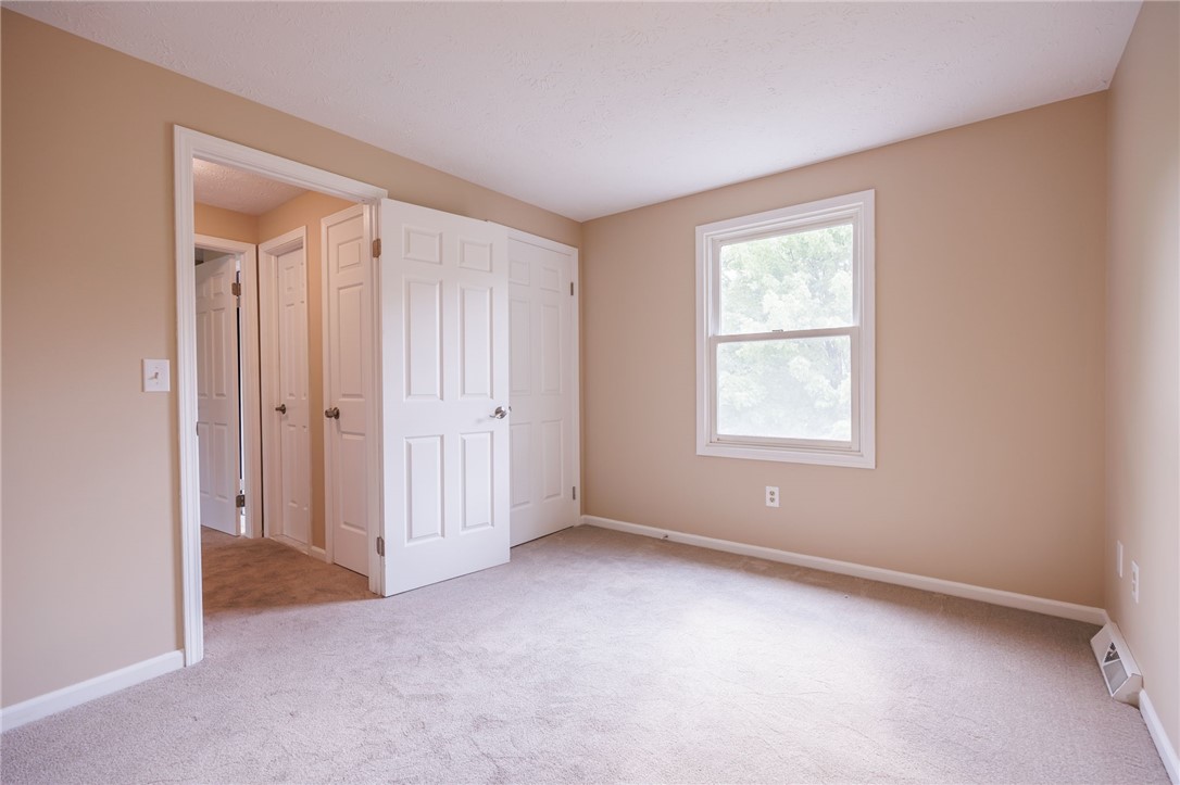3431 South Winton Road Henrietta, NY 14623 - Photo 22 of 37 2nd bedroom with large closet and good wall space