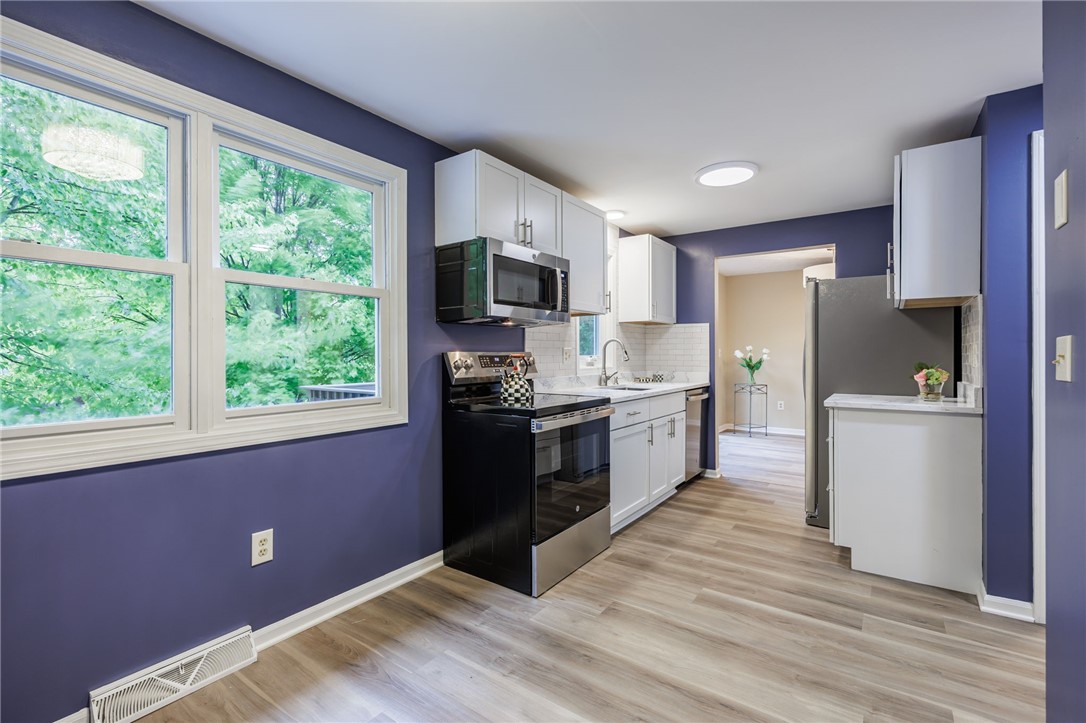 3431 South Winton Road Henrietta, NY 14623 - Photo 7 of 37 All new white Cabinets and Stainless Steel Applian