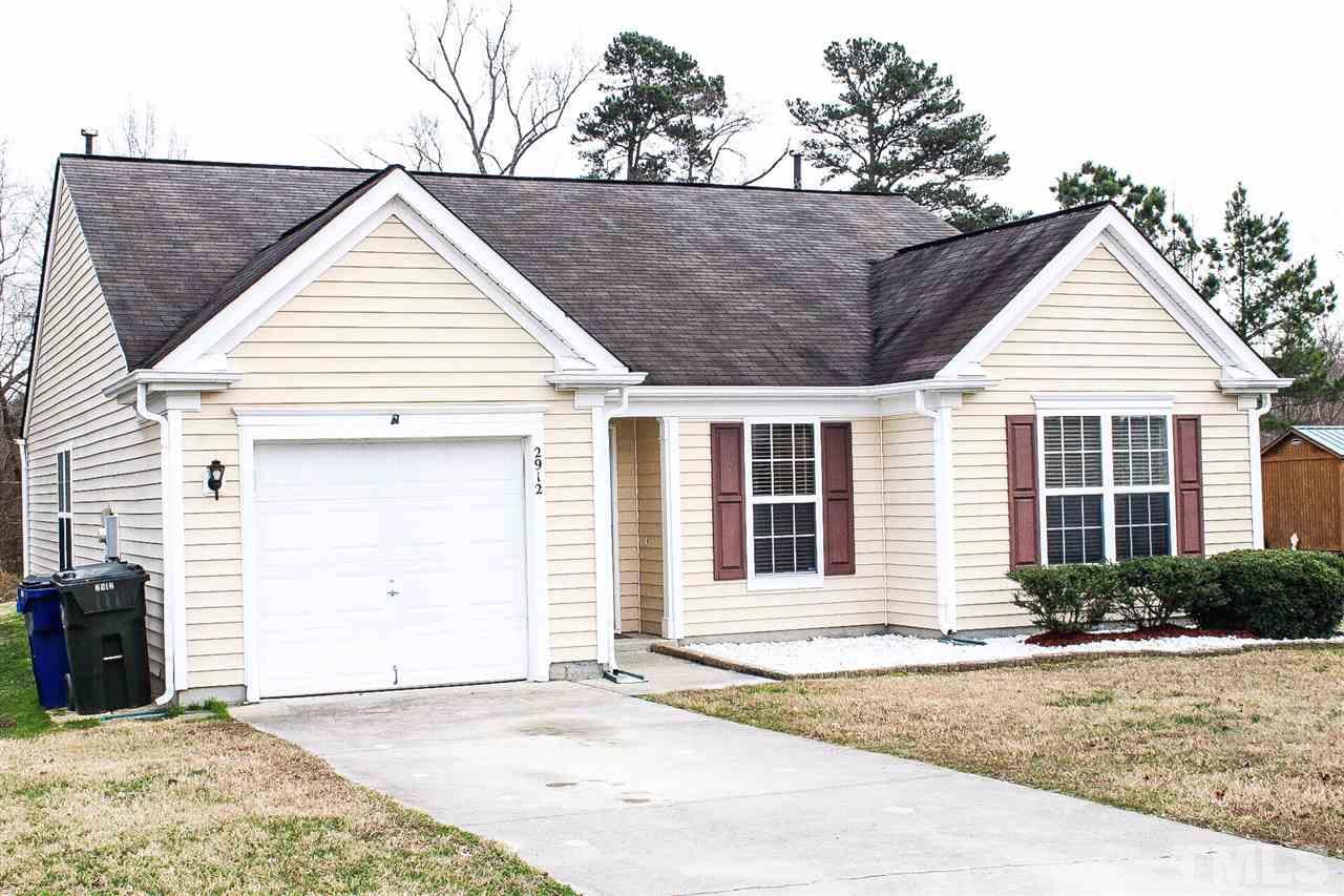2912 Tuckland Drive Raleigh, NC 27610 - Photo 2 of 25 a view of a house with a yard