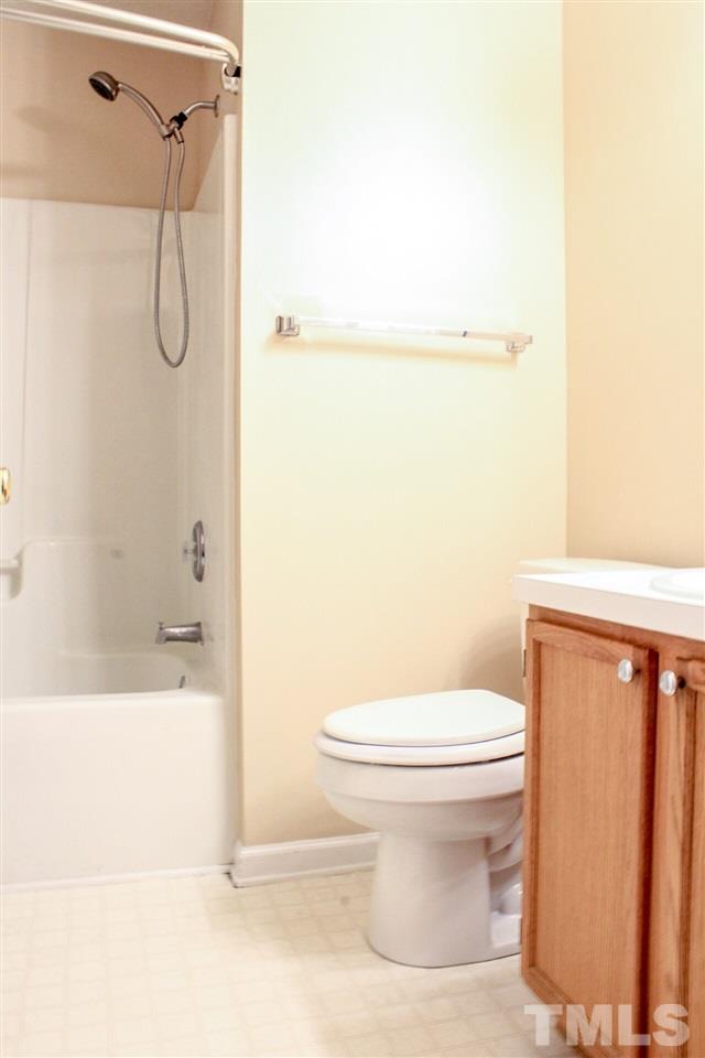 2912 Tuckland Drive Raleigh, NC 27610 - Photo 14 of 25 a bathroom with a toilet and a shower
