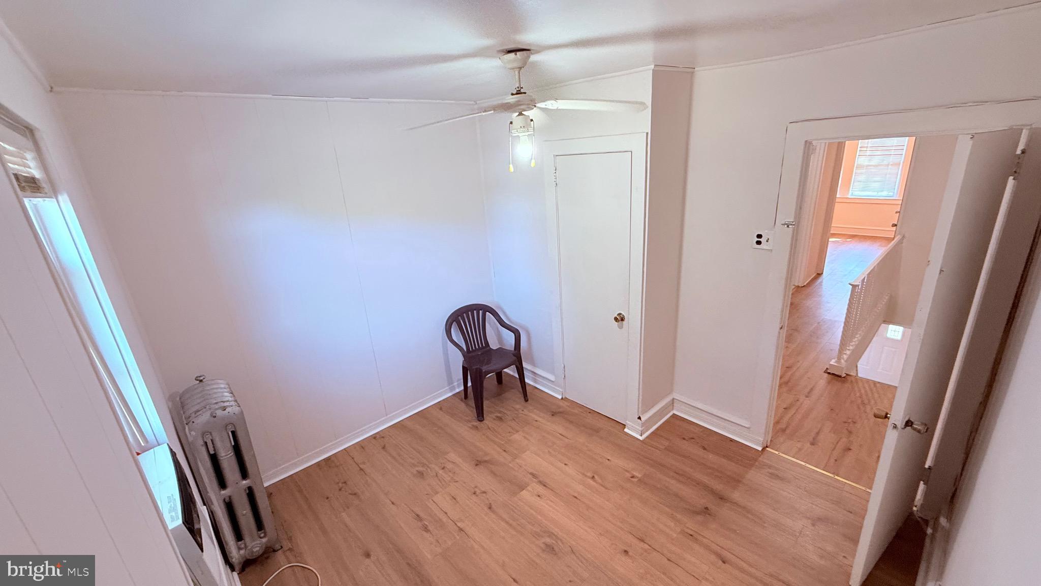 6424 Bingham Street Philadelphia, PA 19111 - Photo 19 of 32 a view of a hallway with wooden floor and stairs
