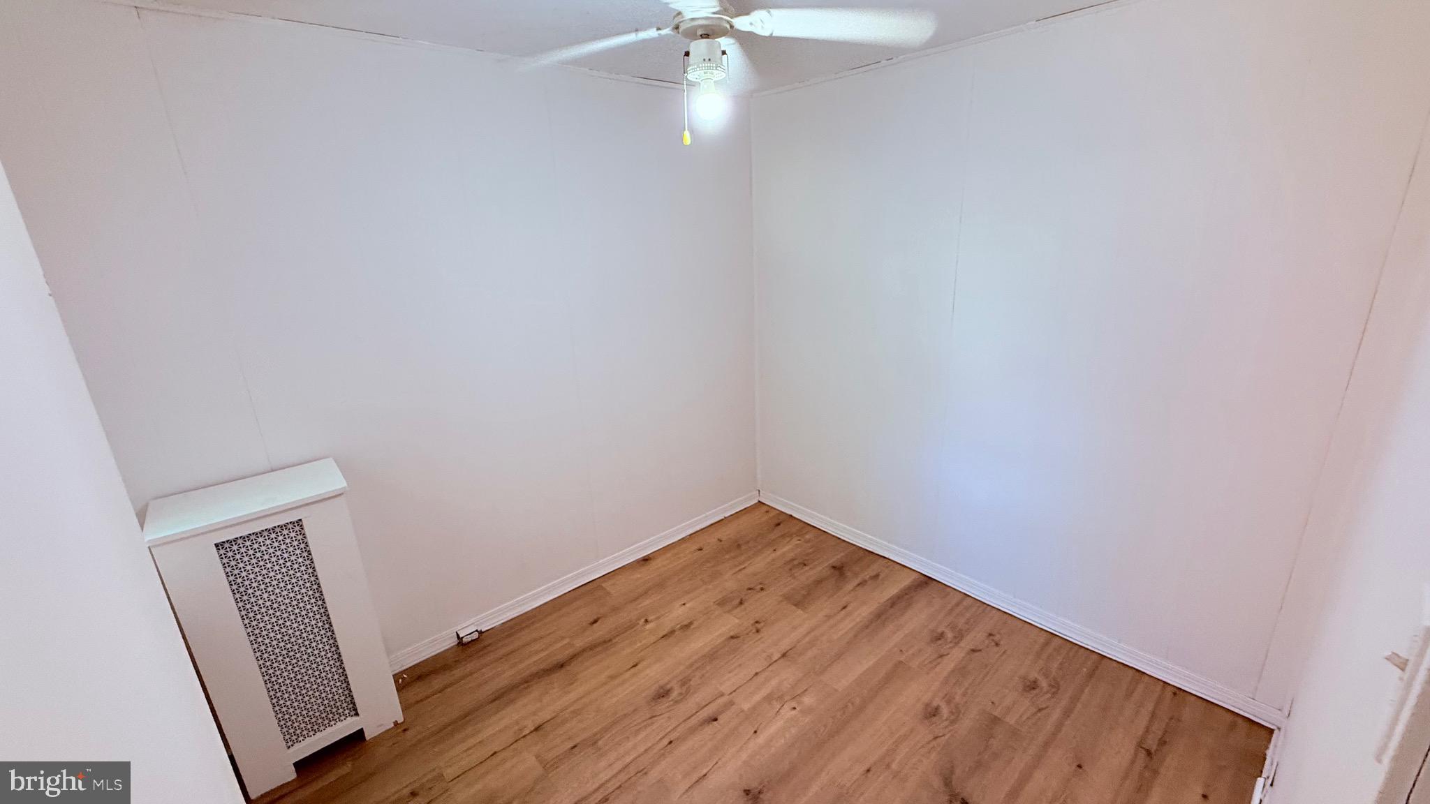 6424 Bingham Street Philadelphia, PA 19111 - Photo 22 of 32 a view of empty room with wooden floor