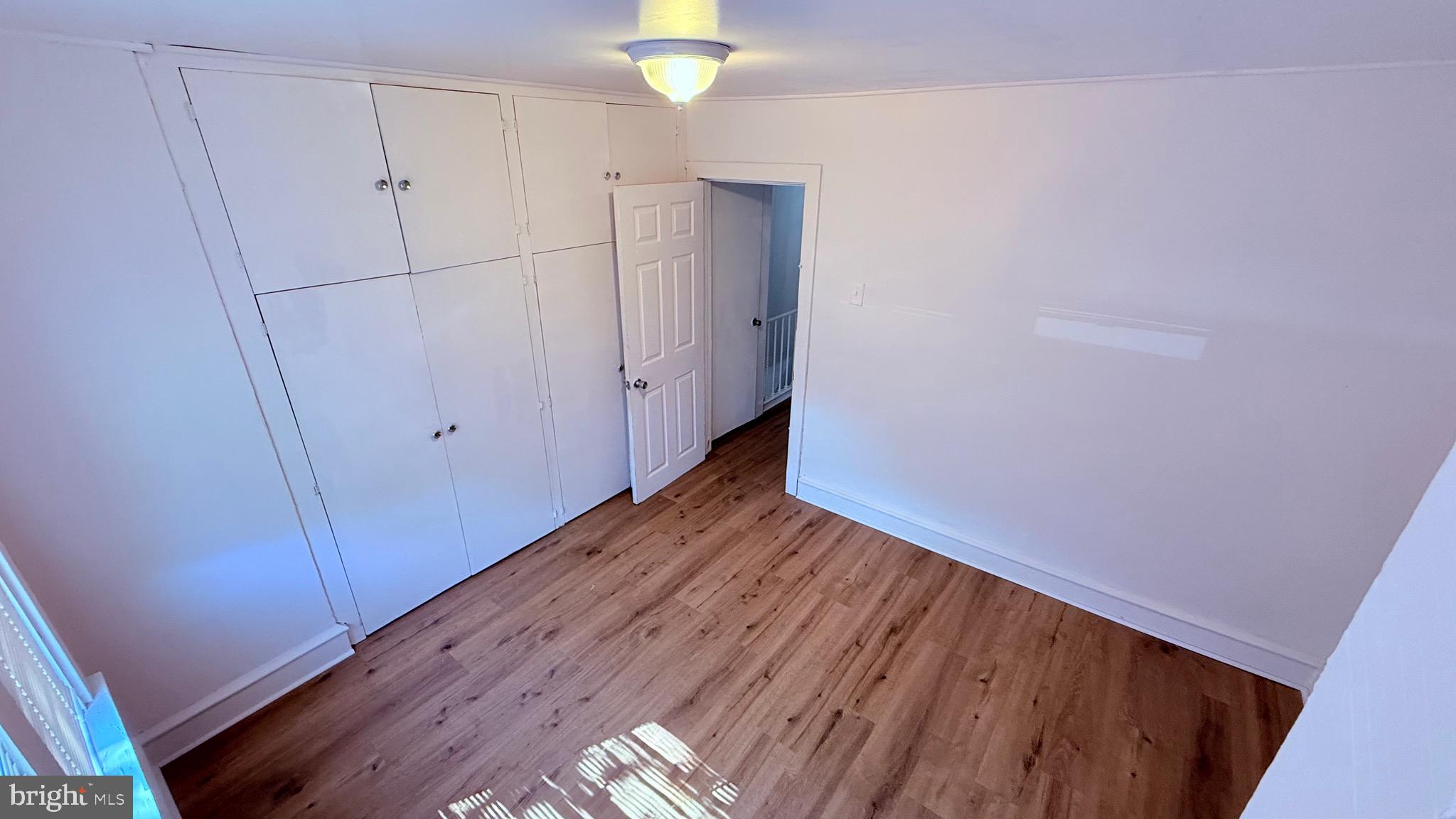 6424 Bingham Street Philadelphia, PA 19111 - Photo 25 of 32 a view of a room with wooden floor